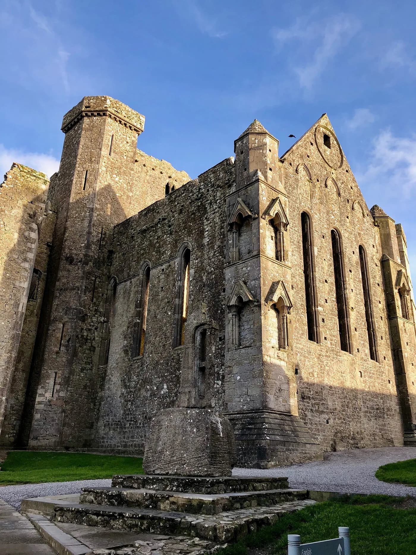 The ruined Gothic cathedral and round tower of the Rock of Cashel