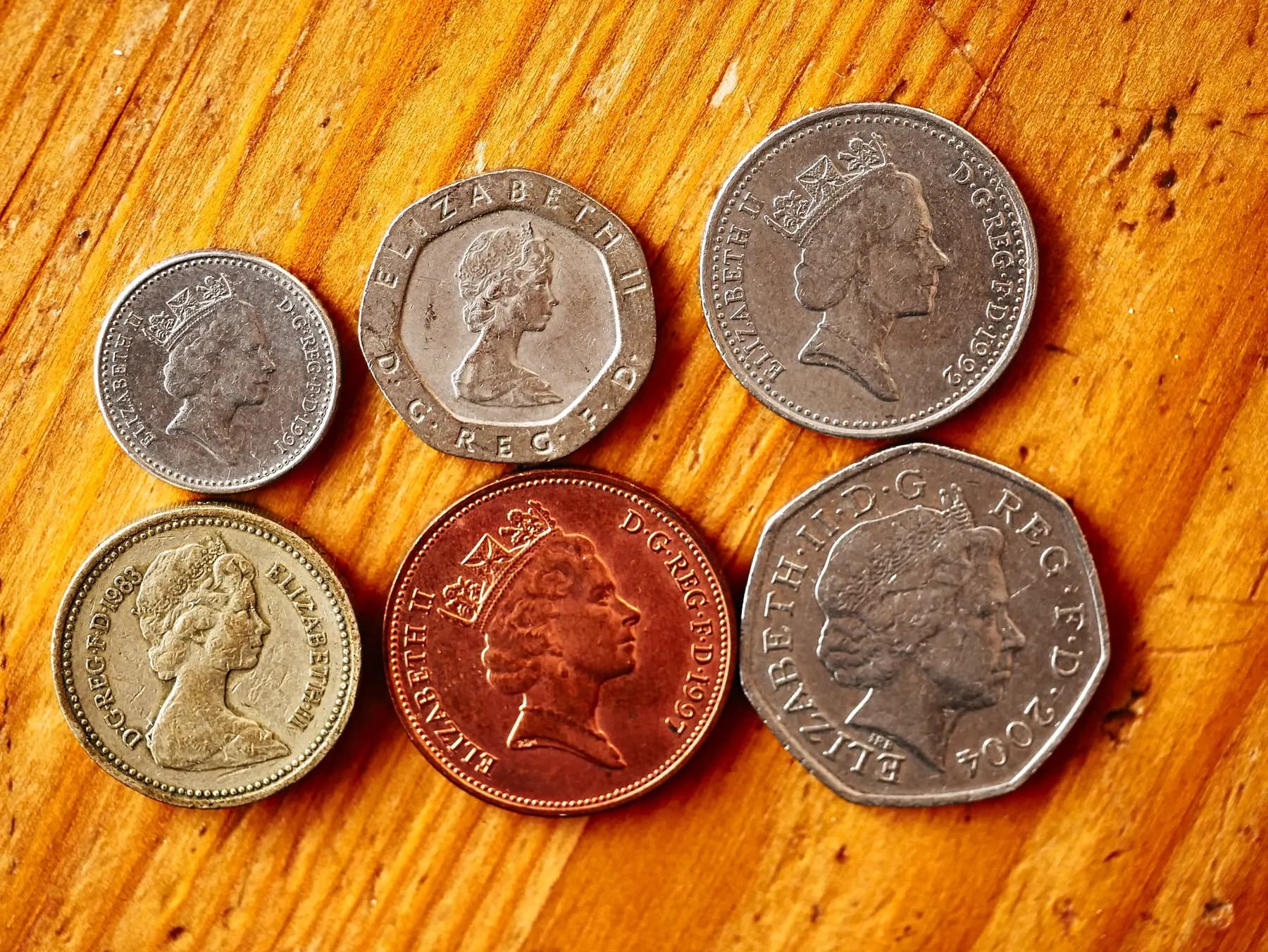 PLACEHOLDER: a spread of sterling banknotes and coins, source and verify before publish